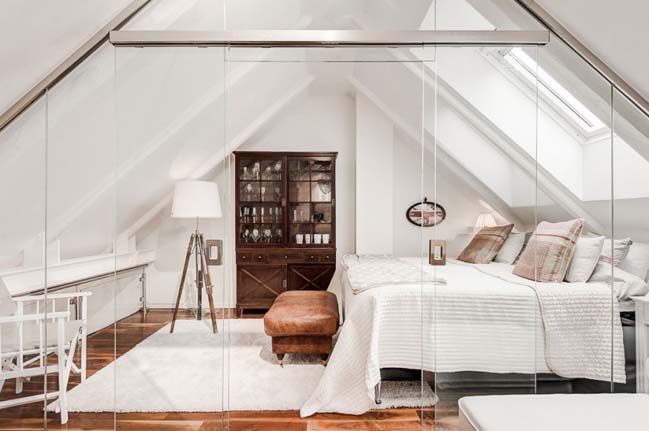Scandinavian attic with glass floor in Sweden