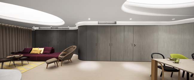 Elegant apartment with luminous ceiling by NCDA