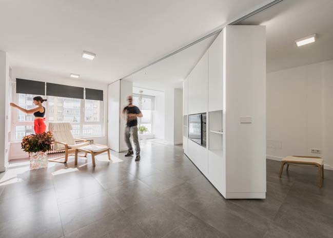 Modern apartment with rotating walls by PKMN Architecture