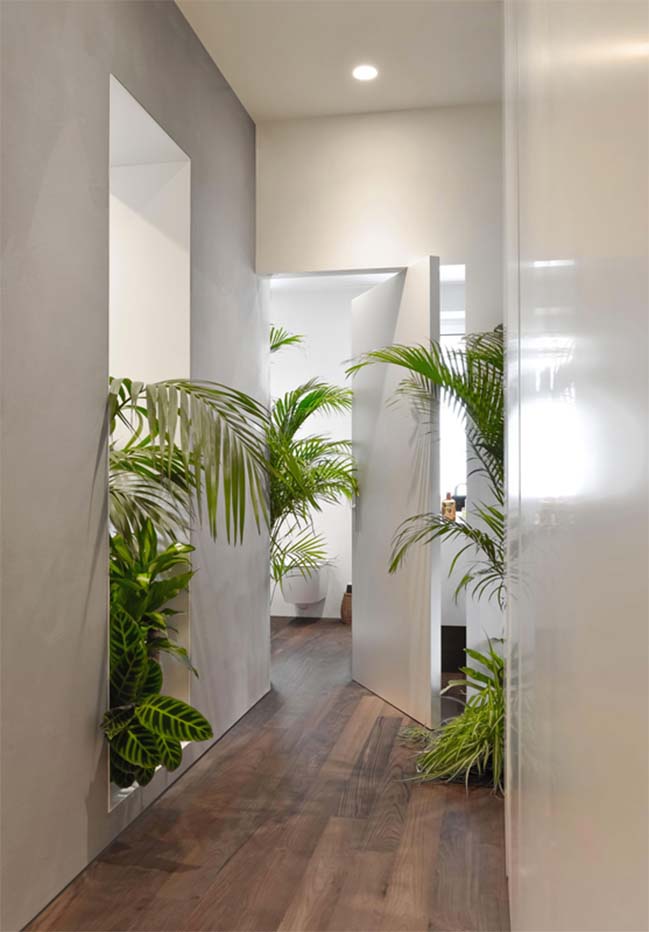 Modern apartment design with numerous plants