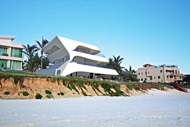 Futuristic house design like as white shells