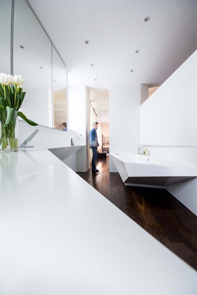 White bathroom design inspired by ice