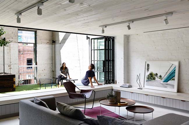Renovate an old brick warehouse into a family home