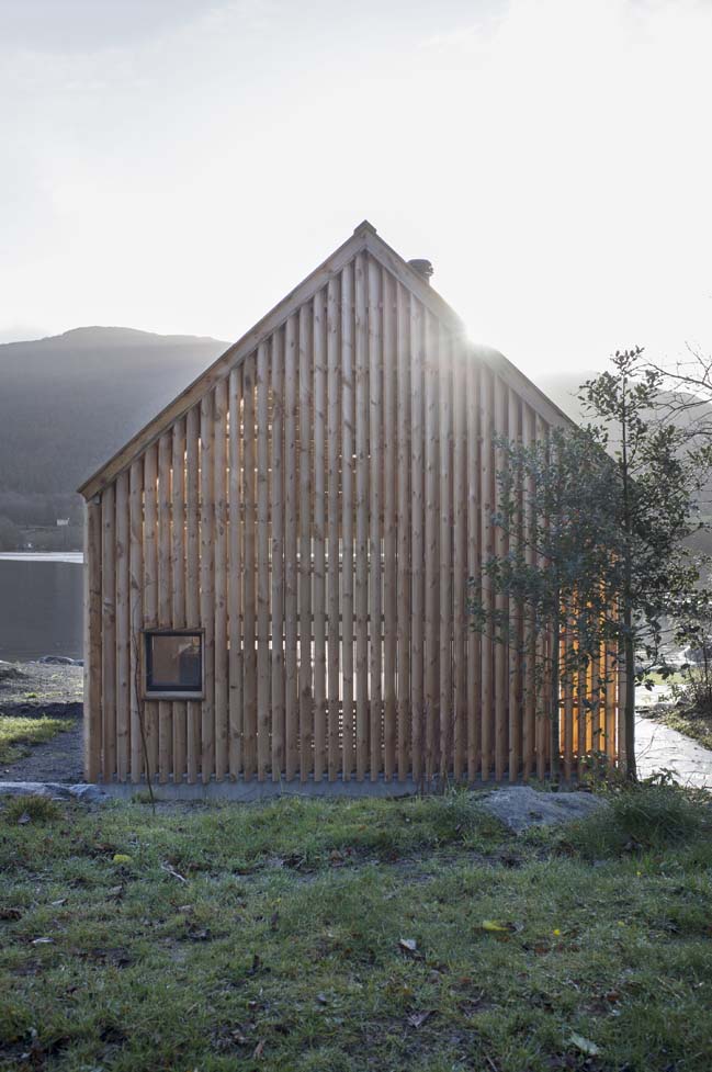Timber boat house by Kolab and Koreo Architects