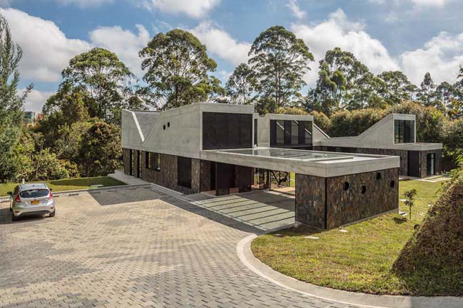 Concrete house in Colombia by PLAN:B