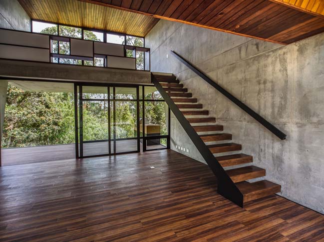 Concrete house in Colombia by PLAN:B