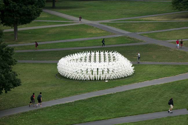 Recyclable Pavilion by 500 white plastic chairs by CODA
