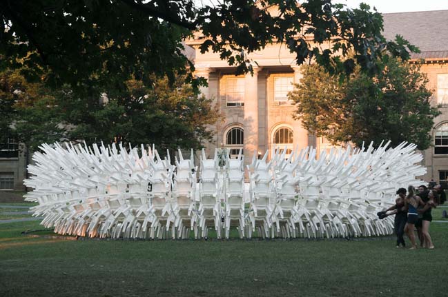 Recyclable Pavilion by 500 white plastic chairs by CODA