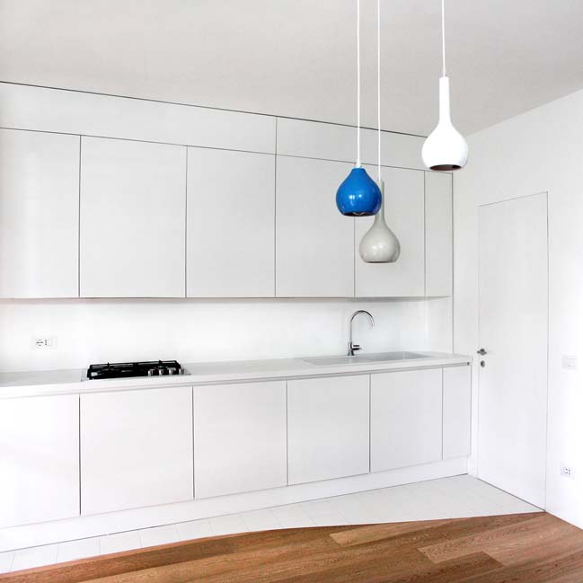 Four-storey apartment renovation by OKS Architetti