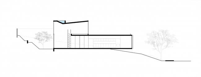 Modern concrete and glass house by Obra Arquitetos