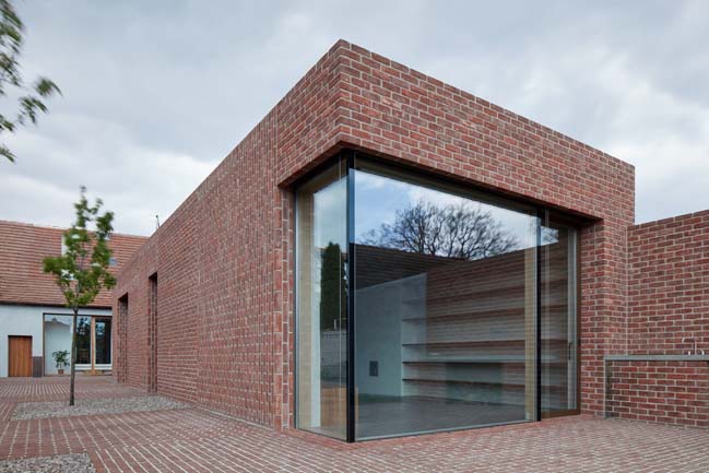 Brick Garden with Brick House by Jan Proksa