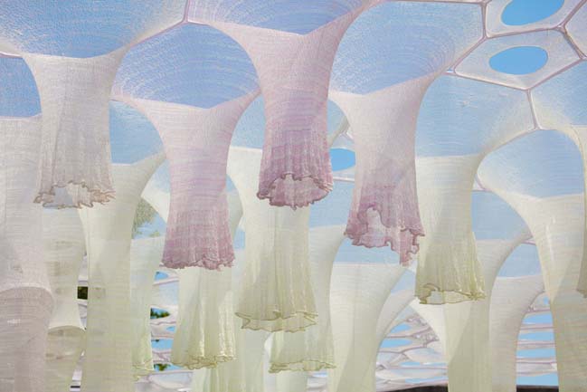Digitally knitted and robotically woven fiber installation by Jenny Sabin