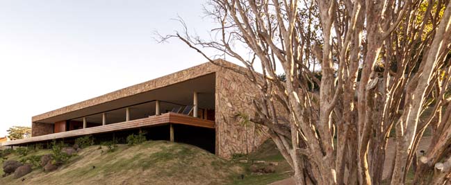 Luxury stone home by mf+arquitetos