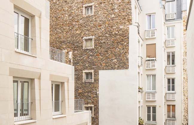 Social Housing Units in Massive Stone by Barrault Pressacco