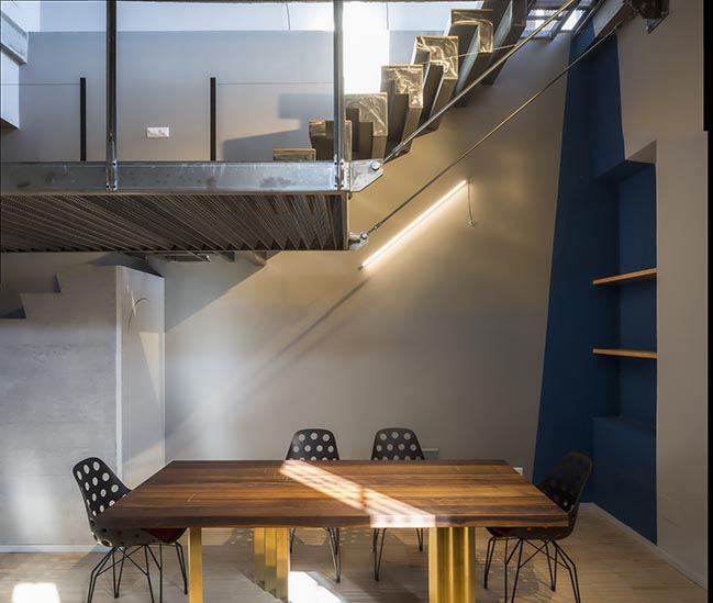 Blue and concrete apartment in Milan by DVDV Studio Architects