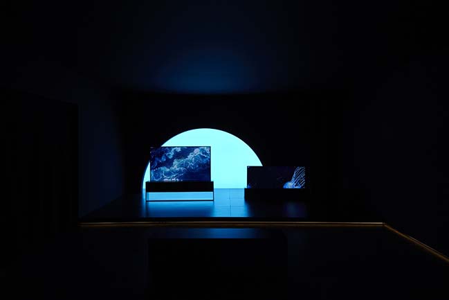 World's first rollable OLED TV by Foster + Partners features at Milan Design Week