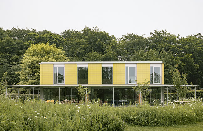 House + Workshop by studio MOTO | Sustainable Design with Harmonious Yellow Tile Facade