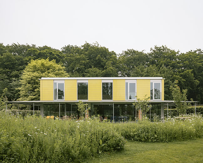 House + Workshop by studio MOTO | Sustainable Design with Harmonious Yellow Tile Facade