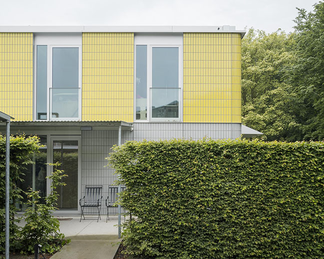 House + Workshop by studio MOTO | Sustainable Design with Harmonious Yellow Tile Facade