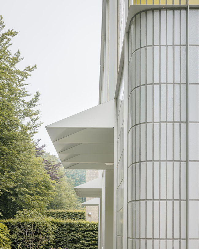 House + Workshop by studio MOTO | Sustainable Design with Harmonious Yellow Tile Facade