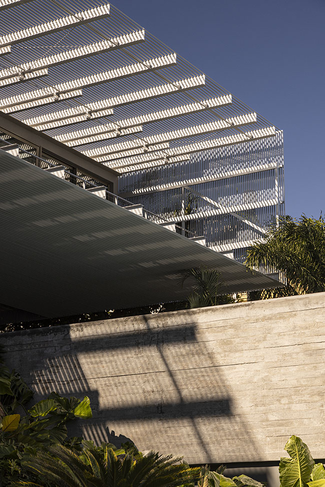 Ponte House by TETRO | Harmonious Coastal Residence on Cacupé Sea with Bridge and Stone Accents