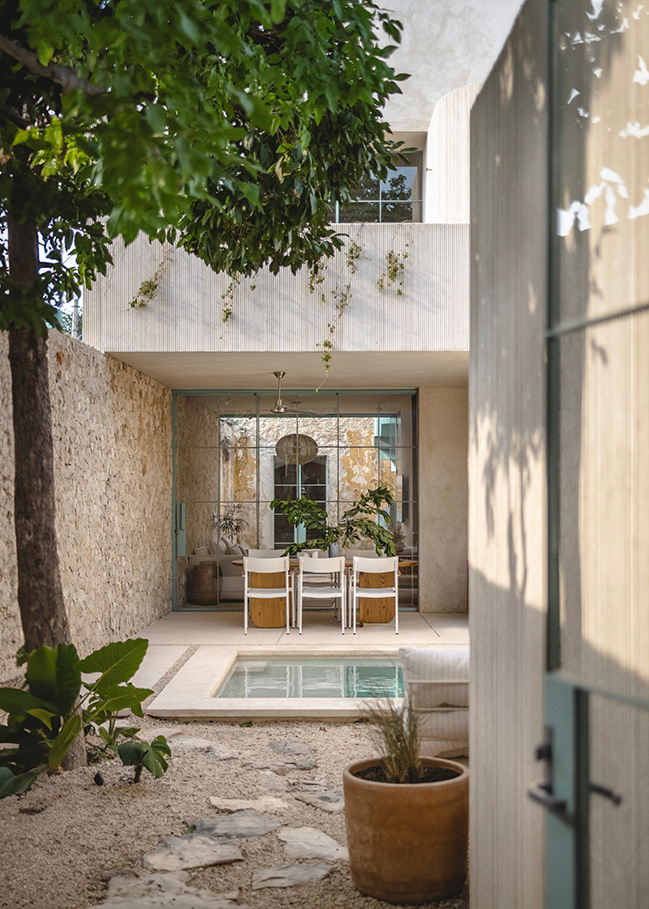 Casa Habitación by Veinte Diezz Arquitectos | Transforms an abandoned into a serene indoor-outdoor dwelling