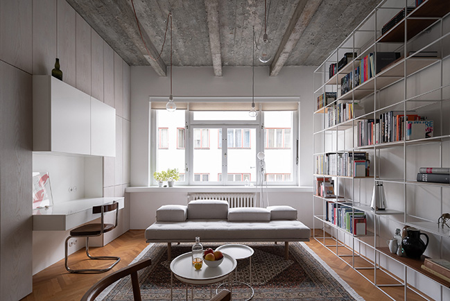Functionalist Apartment with Pink Piggy by Martin Cenek Architecture