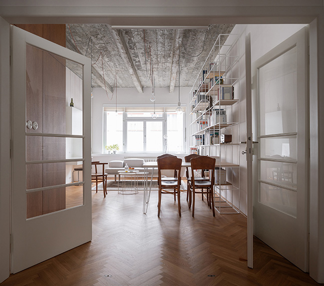 Functionalist Apartment with Pink Piggy by Martin Cenek Architecture