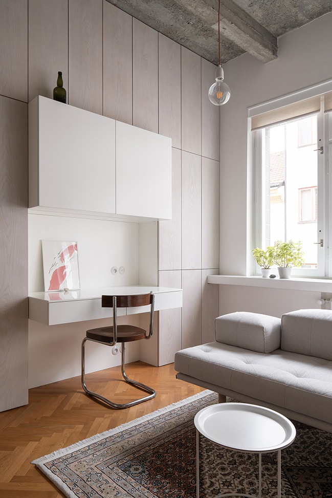 Functionalist Apartment with Pink Piggy by Martin Cenek Architecture