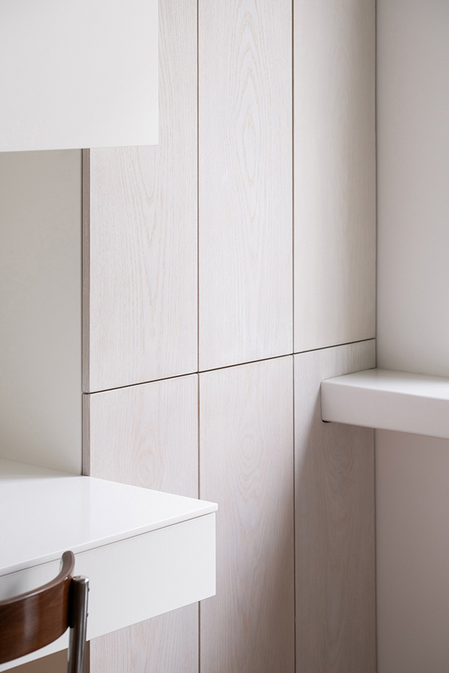 Functionalist Apartment with Pink Piggy by Martin Cenek Architecture