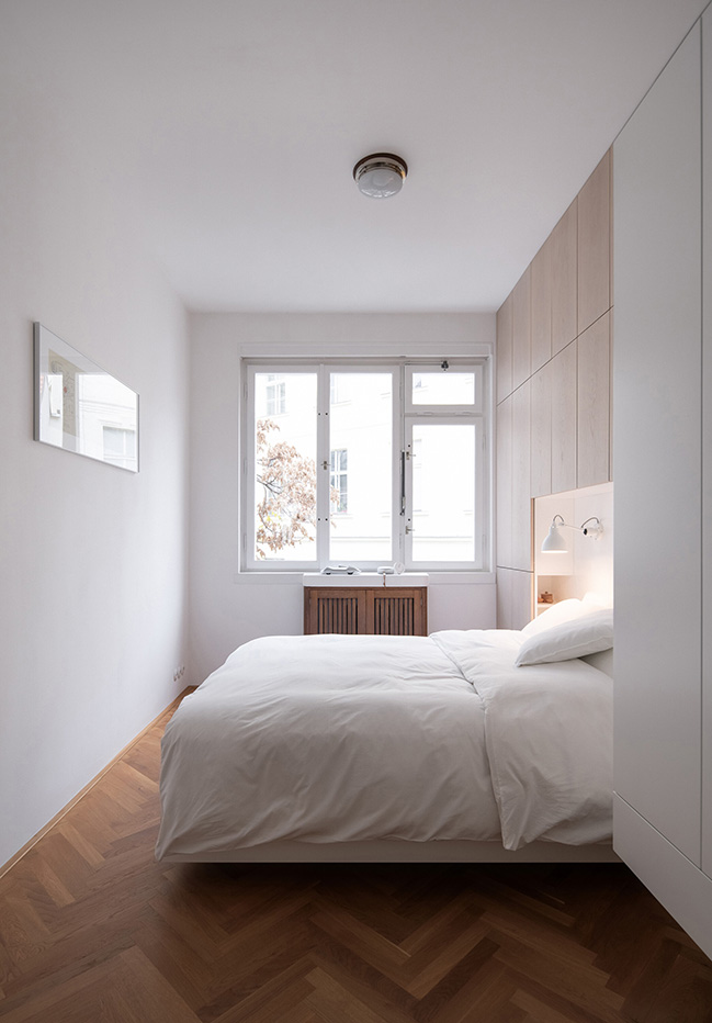 Functionalist Apartment with Pink Piggy by Martin Cenek Architecture