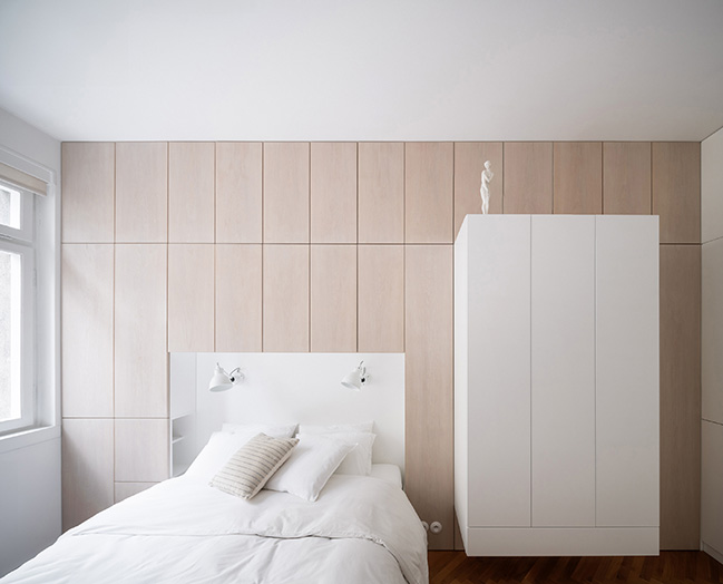 Functionalist Apartment with Pink Piggy by Martin Cenek Architecture