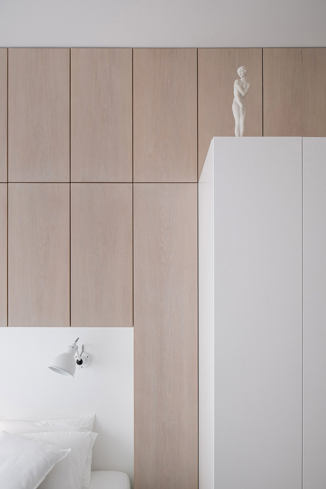 Functionalist Apartment with Pink Piggy by Martin Cenek Architecture