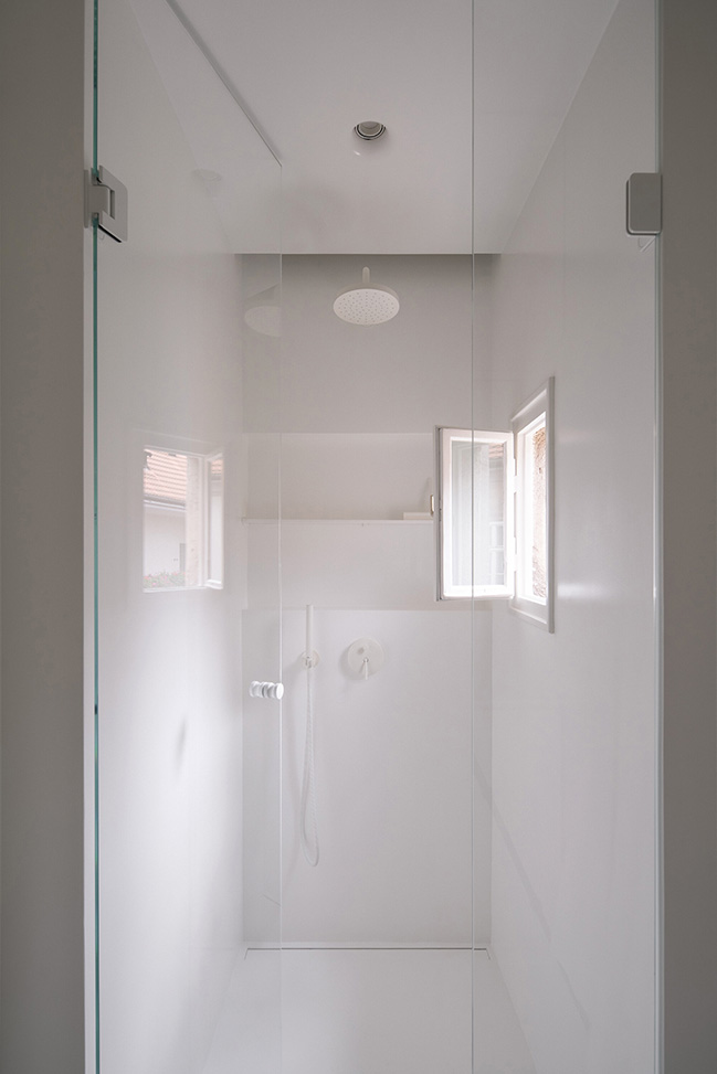 Functionalist Apartment with Pink Piggy by Martin Cenek Architecture