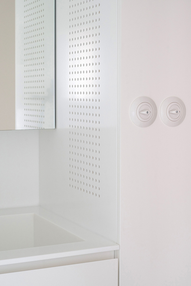 Functionalist Apartment with Pink Piggy by Martin Cenek Architecture