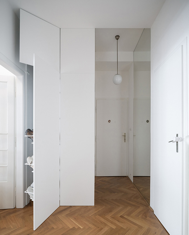 Functionalist Apartment with Pink Piggy by Martin Cenek Architecture