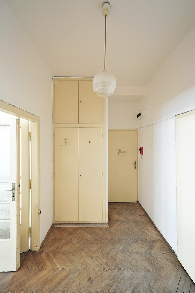 Functionalist Apartment with Pink Piggy by Martin Cenek Architecture