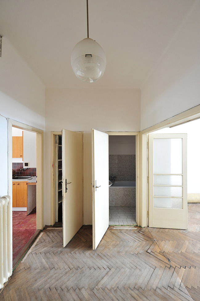Functionalist Apartment with Pink Piggy by Martin Cenek Architecture